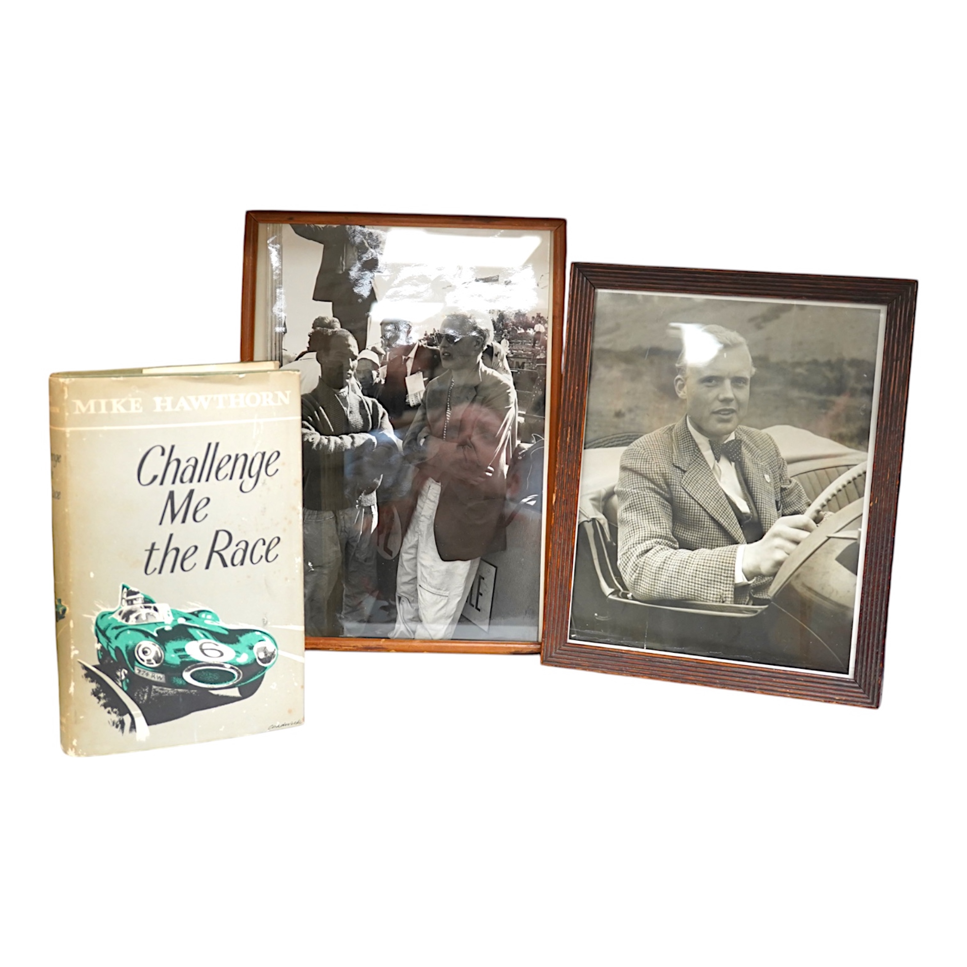 Mike Hawthorn, Challenge me the Race, signed third edition hardback book, together with a framed photograph of Mike Hawthorn, and a press photo of Mike Hawthorn and Stirling Moss (3) Condition - fair